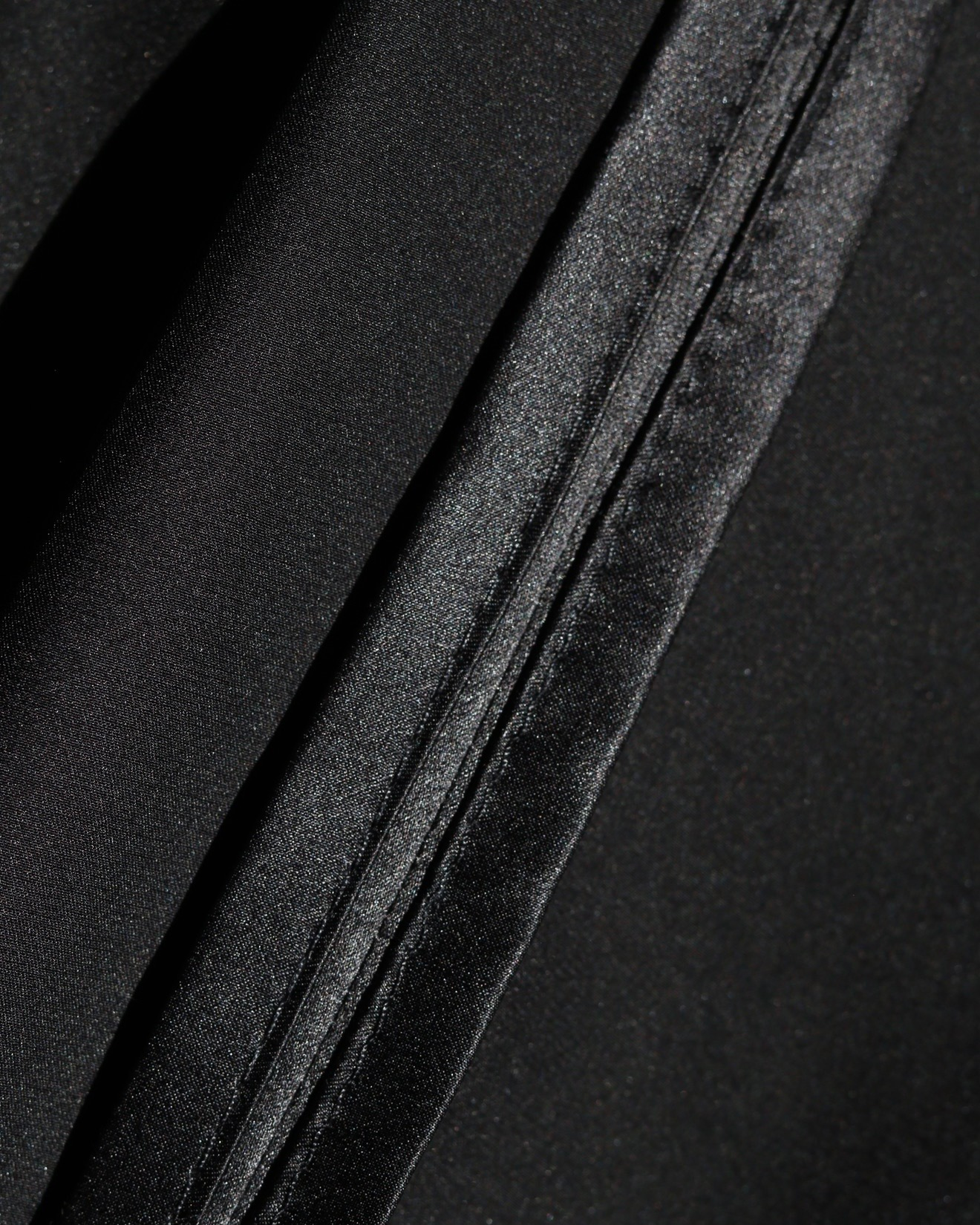 Close-up of structured fabric construction in a Physalia garment